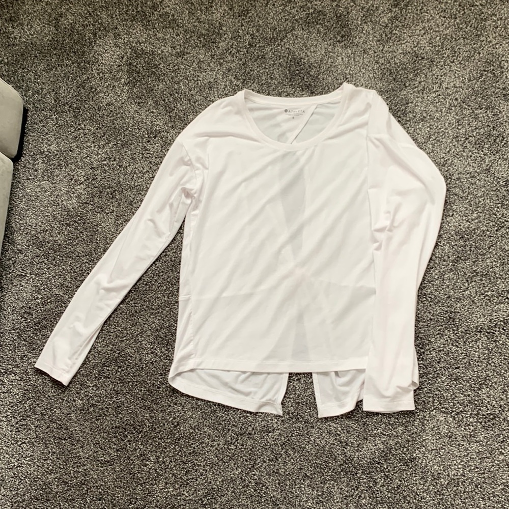 Athleta Essence Twist top with keyhole back accent.